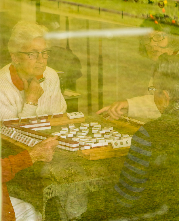 Ladie's of the croquette club caught in their native habitat playing Mahjong