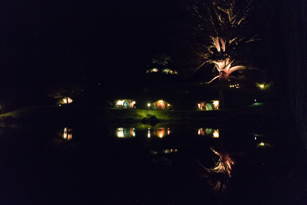 A view of Hobbiton at night from across the river.